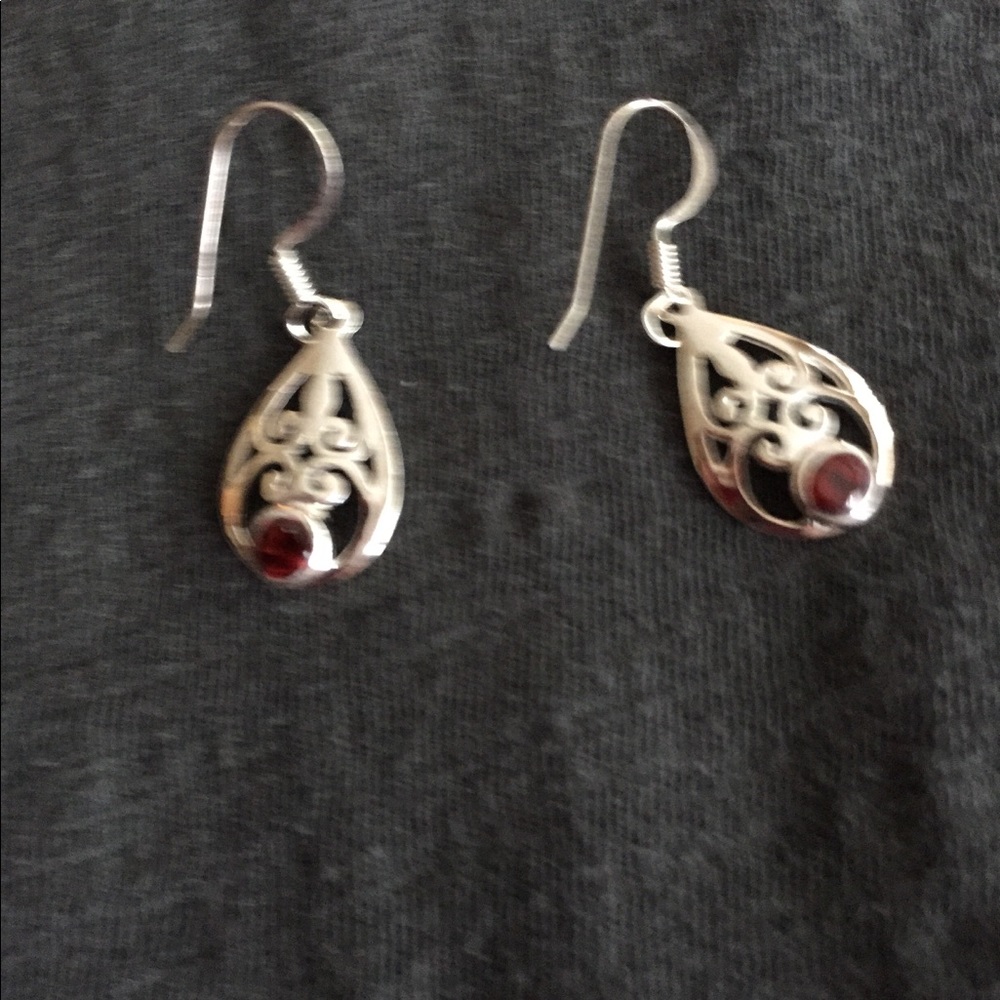 Sterling silver earrings with red stone.